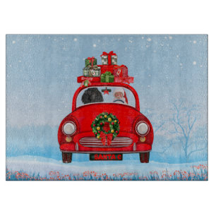 Poodle Dog In Car With Santa Claus Cutting Board