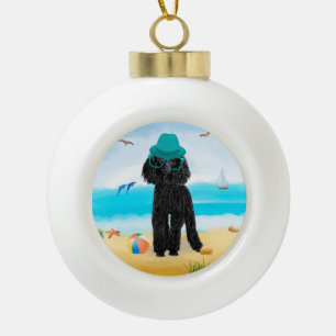 Poodle Dog on Beach Ceramic Ball Christmas Ornament