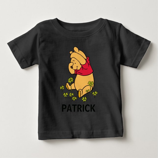 Pooh Playing in a Shamrock Patch Baby T-Shirt (Front)