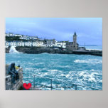 Porthleven Clocktower   Waiting For Fish Sculpture Poster<br><div class="desc">Customizable photos of Cornwall’s beauty, this one of a windy morning at the beautiful fishing town of Porthleven on Cornwall's South Coast. Below the lofty clocktower, the boiling tide is crashing on the outer harbor walls whilst on the West side, the old man and bird (a statue by artist Holly...</div>