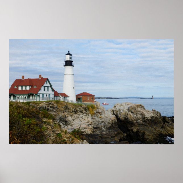 Portland Headlight lighthouse on rocky shore Poster (Front)
