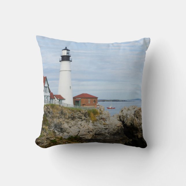 Portland Headlight lighthouse on rocky shore Throw Pillow (Front)