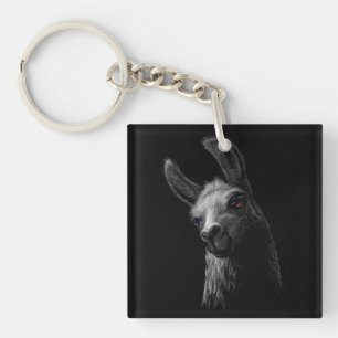 Portrait Head Cute Llama with a Black Background Keychain