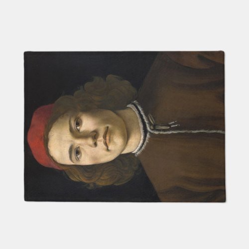 Portrait of a Young Man by Sandro Botticelli Doormat