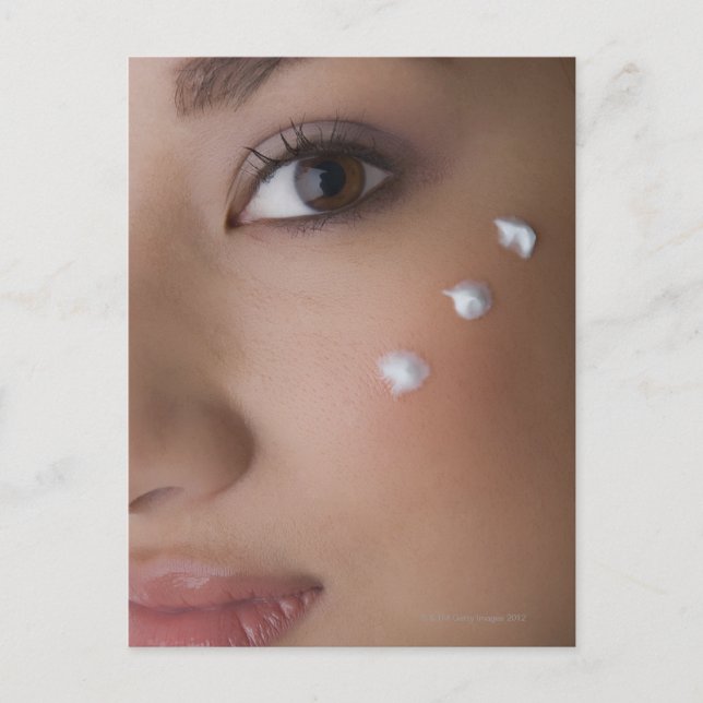 Portrait of a young woman with cream on her postcard (Front)