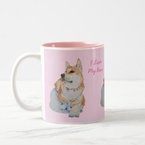 portrait of cute akita cuddling teddy bear Two_Tone coffee mug