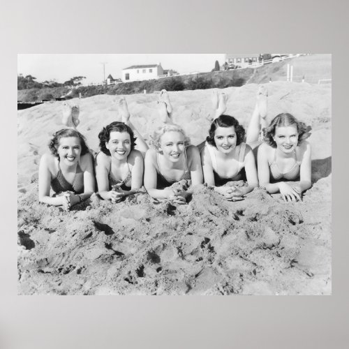 Portrait of five young women lying on the beach an poster