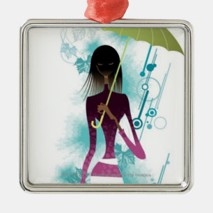 Portrait of young woman holding purse and umbrella metal ornament