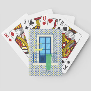 Portuguese tiles and window balcony with bird poker cards