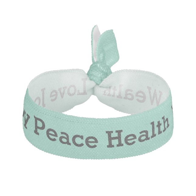Positive word affirmations black on mint ribbon hair tie (Front)