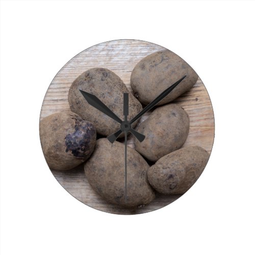 Potatoes on rustic wood Concept Round Wall Clock