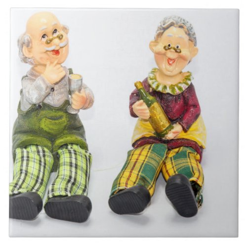Pottery figurines of old couple drinking wine ceramic tile