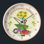 Potting Shed Clock<br><div class="desc">POTTING SHED. (Gardener's clock) Flowers and Garden tools. A great gift for any gardener!</div>