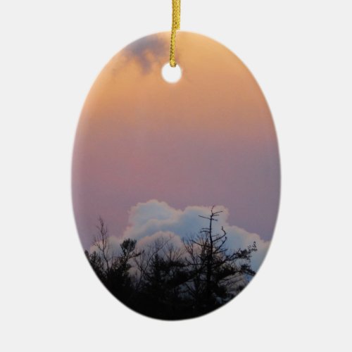 Powder blue clouds in a purple sky ceramic ornament