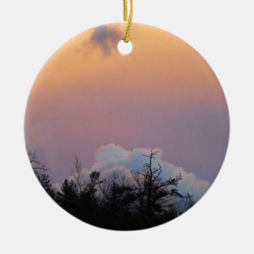 Powder blue clouds in a purple sky ceramic ornament