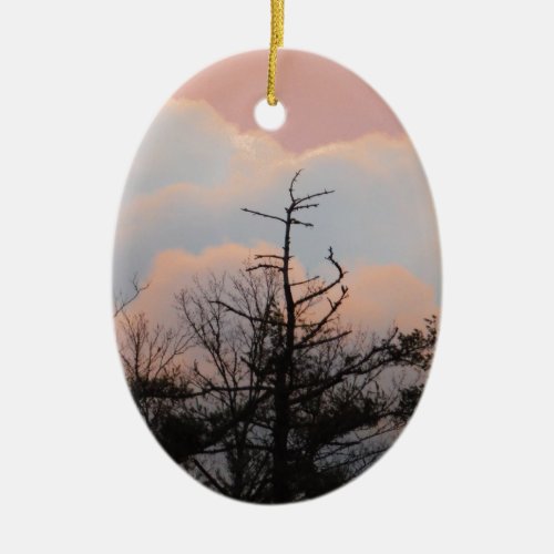 Powder blue clouds in a purple sky ceramic ornament