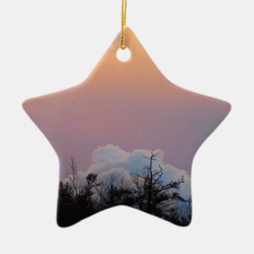 Powder blue clouds in a purple sky ceramic ornament