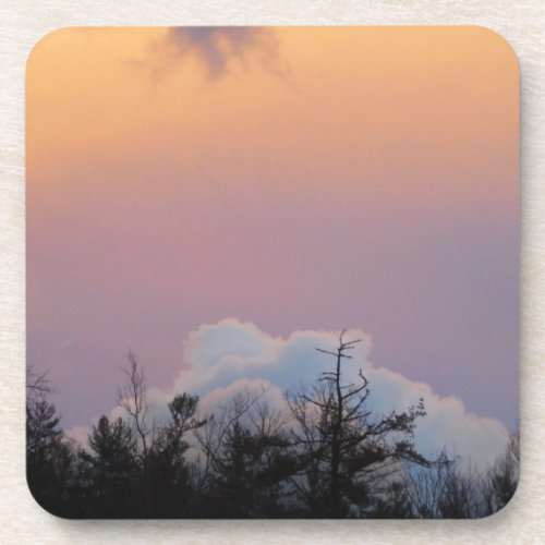 Powder blue clouds in a purple sky drink coaster