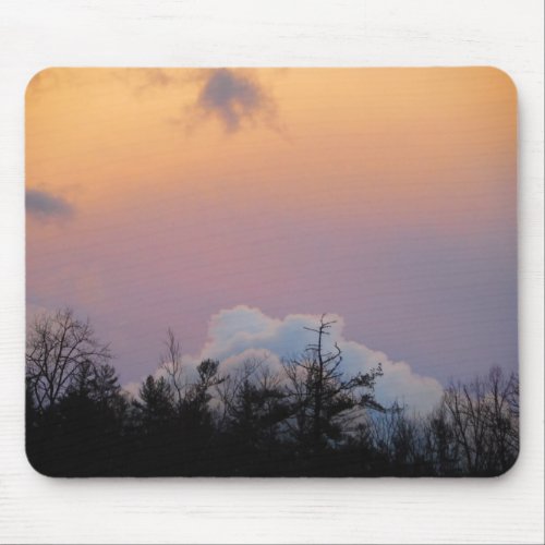 Powder blue clouds in a purple sky mouse pad