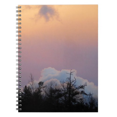 Powder blue clouds in a purple sky notebook