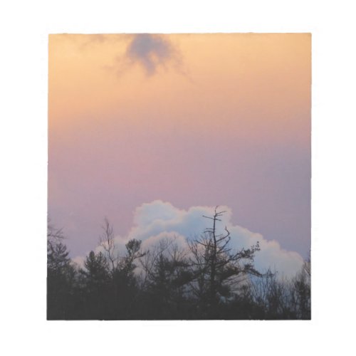 Powder blue clouds in a purple sky notepad