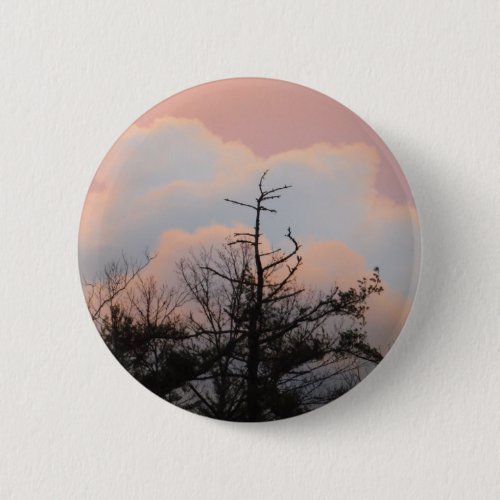 Powder blue clouds in a purple sky pinback button