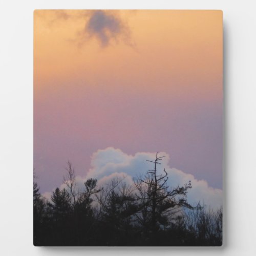 Powder blue clouds in a purple sky plaque