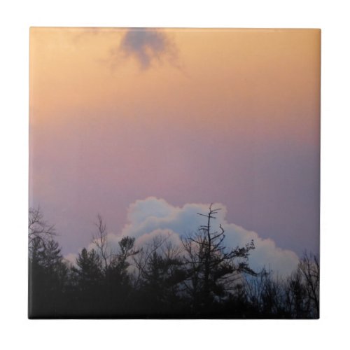 Powder blue clouds in a purple sky tile