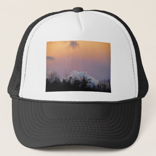 Powder blue clouds in a purple sky trucker hat