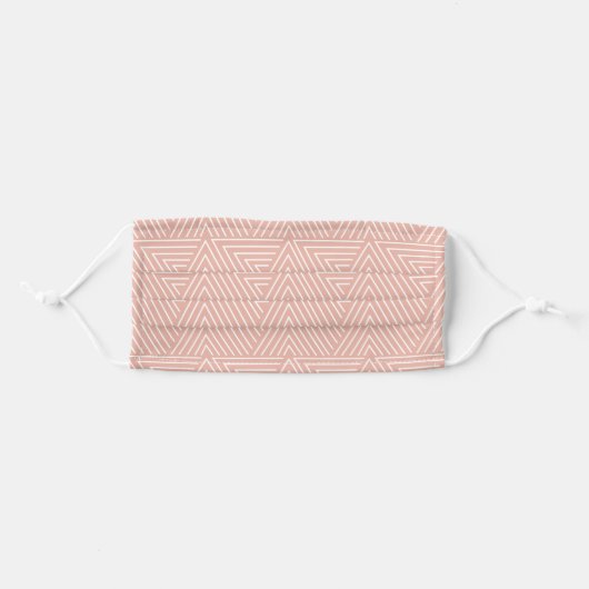 Powder pink and white geometric mudcloth pattern adult cloth face mask (Front, Folded)