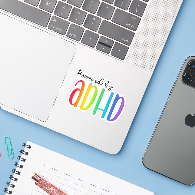 Powered by ADHD | Rainbow Typography Sticker (Laptop w/ iPhone)