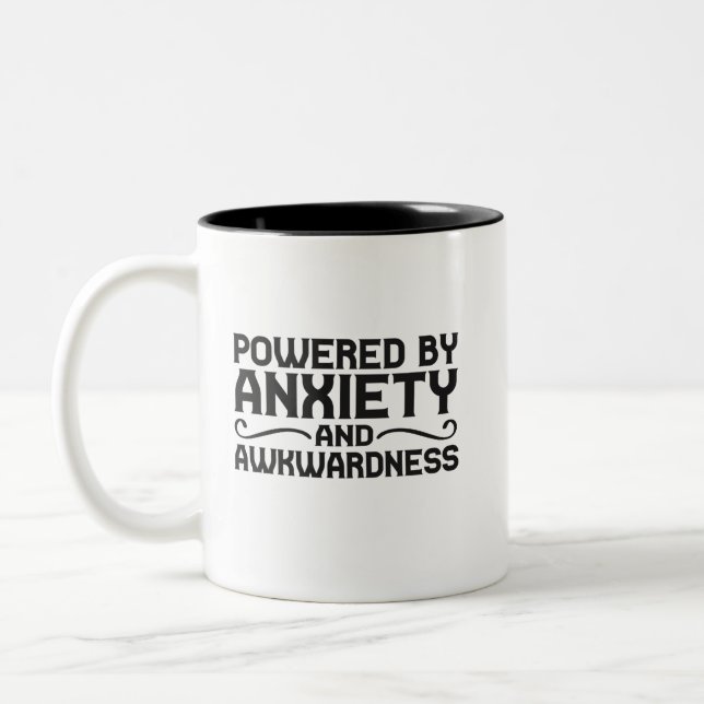 Powered By Anxiety and Awkwardness Funny Introvert Two-Tone Coffee Mug (Left)