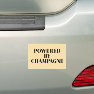 POWERED BY CHAMPAGNE CAR MAGNET