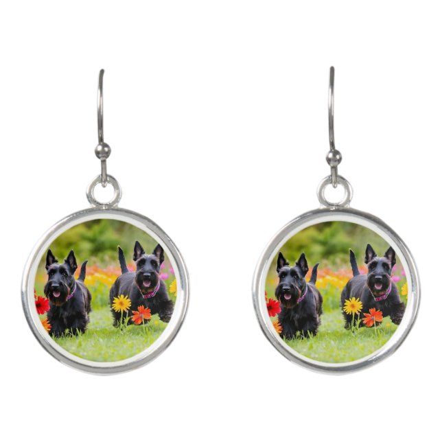 Prancing Scottish Terriers in grass and flowers Earrings (Front)