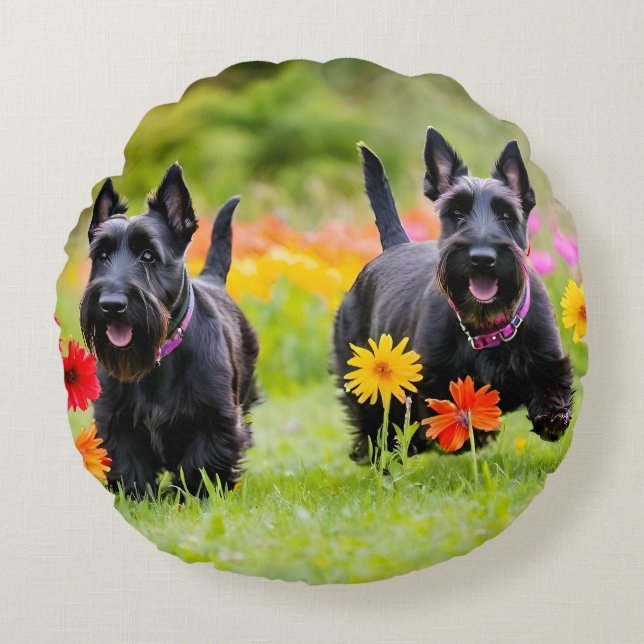 Prancing Scottish Terriers in grass and flowers Round Pillow (Front)