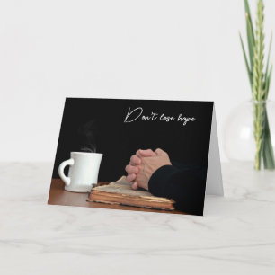 Praying Hands On Old Bible Card