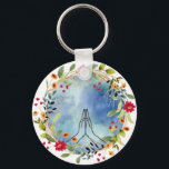Praying Hands Watercolor Keychain<br><div class="desc">Introducing our exquisite keychain featuring a serene design of praying hands against a vibrant watercolor background adorned with delicate flowers. This unique piece effortlessly blends spirituality and artistry, providing both charm and beauty. Perfect for any set of keys, it’s a beautiful way to express your faith and love for creativity....</div>