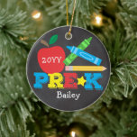 Pre-K Preschool Keepsake Apple Crayons Chalkboard Ceramic Ornament<br><div class="desc">Pre-K ornament design features an apple, a pencil, colorful crayons and bold, fun typography! Click the customize button for more options for modifying the text! Variations of this design, additional colors, as well as coordinating products are available in our shop, zazzle.com/store/doodlelulu. Contact us if you need this design applied to...</div>