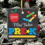 Pre-K Teacher Keepsake Chalkboard Colorful Ceramic Ornament<br><div class="desc">Pre-K teacher ornament design features an apple, a ruler, crayons and bold, colorful fun typography! Click the customize button for more options for modifying the text! Variations of this design, additional colors, as well as coordinating products are available in our shop, zazzle.com/store/doodlelulu. Contact us if you need this design applied...</div>