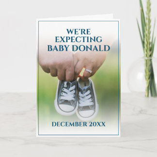 Pregnancy Announcement with Baby Shoes