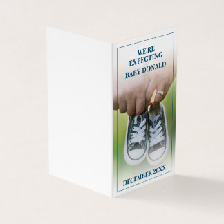 Pregnancy Announcement with Baby Shoes