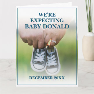 Pregnancy Announcement with Baby Shoes