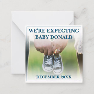 Pregnancy Announcement with Baby Shoes
