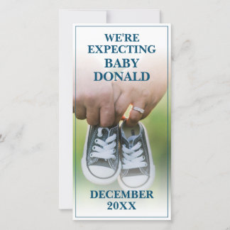 Pregnancy Announcement with Baby Shoes