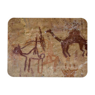 Prehistoric rock paintings with camels and magnet