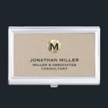 Premium Beige Linen Gold Monogram Business Card Case<br><div class="desc">Show off your style and sophistication with this premium beige linen business card case featuring a luxurious gold monogram. Featuring a brushed gold monogram medallion with your name company and title in classic block typography, this case is a great way to keep your business cards organized and protected. The beige...</div>