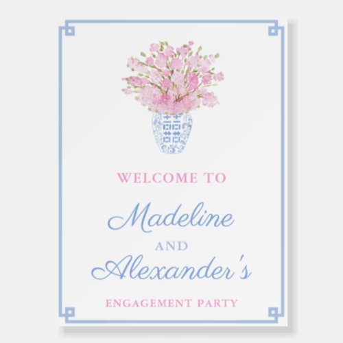 Preppy Blush And Sky Blue Engagement Party Welcome Foam Board - Timeless pink cherry blossom stems in a blue and white ginger jar vase decorate this party welcome sign design. Shown here for an Engagement Party but all of the text can be customized to your needs. With regards to the Greek Key border, you can change the color of this by changing the background color of the design (enter the design tool by clicking / tapping to personalize further). If you need the poster in another size ratio then you might need to adjust this border so it remains the correct distance from the edge. To do this, select one of the layers called "Greek Key half corner..." and use the arrows on your keyboard to move left or right). You'll need to do each half of the background separately.