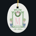 Preppy Chinoiserie Christmas Pagoda Monogram  Ceramic Ornament<br><div class="desc">This Christmas Ornament has a Preppy Chinoiserie design featuring a green bamboo pagoda frame with a Christmas wreath with a pink bow and two topiaries in Chinoiserie pots. You can personalize with a name and your initial.</div>
