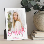Preppy Hot Pink Script Graduation Photo Plaque<br><div class="desc">Celebrate your graduate's achievement with a custom graduation photo keepsake. The plaque features the graduate's photo inside of a white textured mask frame with "Graduate" in a hot pink handwritten script. Personalize the graduation photo plaque by adding the graduate's name,  school,  and graduation year.</div>