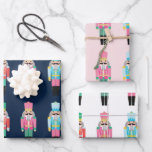 Preppy Nutcracker Wrapping Paper Sheets, Set of 3<br><div class="desc">Dress your gifts with these fun,  preppy nutcracker pattern gift wrapping sheets. Sold in a set of three,  each with a different background. Navy blue,  light pink and white.</div>